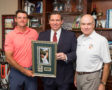 U.S. Postal Service Honors American Icon and Golf Champion Arnold Palmer.L to R:Sam Saunders, Governor Ron DeSantis andRoman Martinez IV.